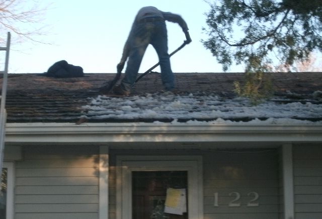 A total roof replacement, with a woodshake tear off and replaced with a hail resistant class 4 shingle 
